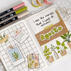 an open planner book with stickers and markers