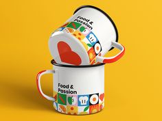 two coffee mugs stacked on top of each other with the words food & passion printed on them