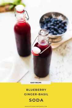 blueberry ginger - basil soda recipe in glass bottles with spoons on the side