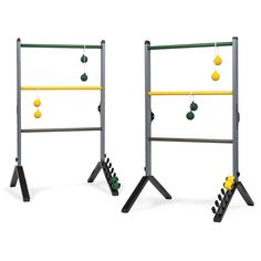 two children's gym equipment with balls hanging from the top and bottom bars on each side