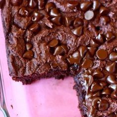 a close up of a cake with chocolate chips on it