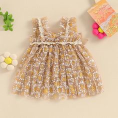 Dress your little one in the perfect combination of cuteness and elegance with our AUTUMN SUN Floral Tulle Dress. Perfect for summer, this dress features cute bows and beautiful floral tulle design that is sure to make your baby girl stand out. She will stay stylish and comfortable with this must-have dress! Tulle Outfit, Tulle Skirts Outfit, Floral Tulle Dress, Baby Girl Princess Dresses, Flower Romper, Autumn Sun, Toddler Girl Summer