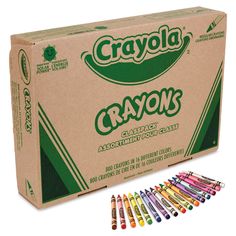 crayons are lined up in a cardboard box and ready to be filled with colored crayons