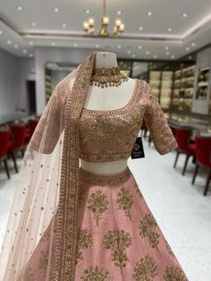 Indulge in the opulence of our Blush Pink Bridal Lehenga BL-110. This exquisite lehenga features a stunning blush pink color that exudes romance and elegance. Crafted with the finest materials, this lehenga is the embodiment of luxury and sophistication. Elevate your bridal look with this exquisite piece. Fabric: Raw Silk! WASH CARE INSTRUCTIONS - Please Dry clean only when it is applicable! Ready to Ship! Unstitched Tilla Lehenga For Wedding, Pink Traditional Drape Sets For Reception, Wedding Lehenga Unstitched With Tilla, Unstitched Wedding Lehenga With Tilla Embroidery, Pink Sets With Traditional Drape For Reception, Semi-stitched Pink Sets For Wedding, Wedding Semi-stitched Pink Sets, Pink Dola Silk Anarkali Set For Wedding, Pink Lehenga With Sheer Dupatta For Wedding