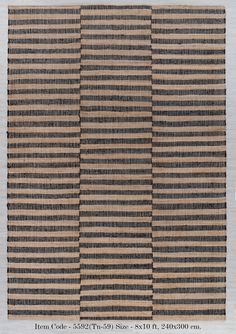 an area rug with horizontal stripes in black and tan colors, on a white background