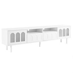 a white tv stand with two doors and three shelves on one side, in front of a white background