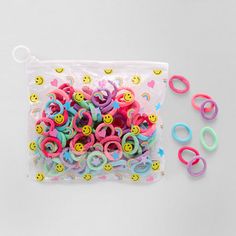 Stock up on essentials for your girl with this handy 100-piece hair tie set from Capelli of N.Y. It includes 100 stretchy hair ties in assorted colors housed in a clear smiling emoji-print pouch for easy storage. # Pieces In Set: 100Features: AdjustableMeasurements: .78 Height/Inches, 7.1 Width/Inches, 8.8 Length/InchesFiber Content: 100% PolyesterFabric Description: Yarn Dyed WovenHair Good Type: PoniesCountry of Origin: Imported Smiling Emoji, Girls Handbags, Your Girl, Tie Set, Accessories Hair, Hair Tie, Easy Storage, Yarn Dyeing, Handbag Accessories