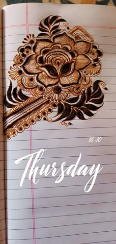 an open notebook with the words thursday written on it