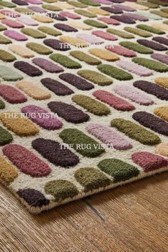 an area rug with different colors and shapes