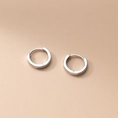 A Pair Of Classic Plain Silver Hoop Huggies Earrings Description: ............................................ Metal: The Earrings Are Made From Solid 925 Sterling Silver, Finest Silver, Nickel Free Measurement: - Hoop(Outer) Diameter Options: Approximately 13mm; - Hoop(Inner) Diameter Options: Approximately 11mm - Width Of Hoop Is About 2mm/0.08 Inches; - Thickness Approximately 1.2mm/0.05inches; Earring Closure: Hinged-Hoop Color: Silver. ................................................ This I Small Silver Earrings, Santa Ideas, Marcasite Earrings, Huggie Earrings Silver, Pineapple Earrings, Dainty Hoop Earrings, Jeweled Earrings, Geometric Earrings, Silver Hoops