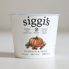 an ice cream cup with pumpkin and spice on it