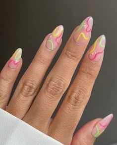 Ready to elevate your spring nail game? Explore 34 Insanely Cute Spring Nail Design Ideas that will add a pop of color and style to your fingertips! From vibrant florals to delicate pastels, we've curated the ultimate collection of nail designs to welcome the season in style. Whether you prefer simple and chic or bold and playful, these ideas will inspire your next manicure. Green And Pink Swirl Nails, Abstract Swirl Nail Art, Bright Swirl Nails, Squiggly Nail Art, Rainbow Swirl Nails, Fresh Nail Designs, Spring Nail Design, Trendy Summer Nails, Fresh Nail