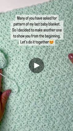 someone is crocheting a baby blanket with yarn