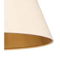 a white and gold lamp shade hanging from a ceiling