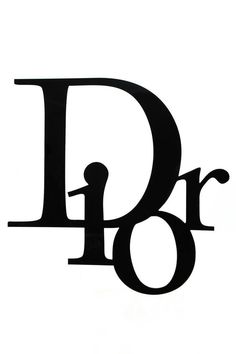 the letter d is made up of black metal and has an oval design on it