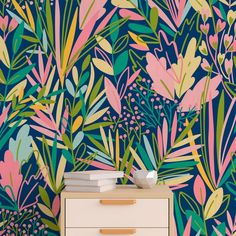 the wallpaper is very colorful and has flowers on it