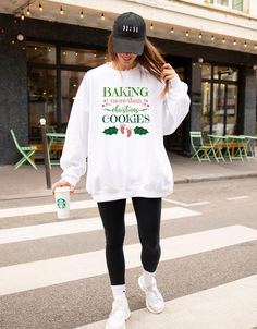 🎄 Baking More Than Christmas Cookies! 🎄 Surprise your loved ones with the sweetest holiday news this season! Our cozy Christmas pregnancy announcement sweater features the fun and heartwarming phrase "Baking More Than Christmas Cookies," making it the perfect way to share your exciting news in a festive, memorable way. ✨ Why You'll Love It: Soft and Comfy: Made with high-quality, ultra-soft fabric to keep you cozy all season long. Perfect for Holiday Photos: This charming pregnancy reveal swea Operation Christmas Children, Unique Pregnancy Announcement, Baby Announcement Shirt, Baby Announcement Shirts, Mother To Be, Christmas Pregnancy Announcement, Pregnancy Announcement To Husband, Christmas Pregnancy