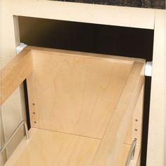 an open drawer on the side of a cabinet