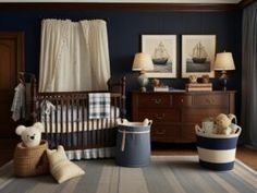 a baby's room with blue walls and striped rugs, teddy bears in crib