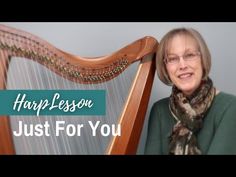 a woman holding a harp with the words harp lesson just for you