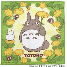 an image of a totoro with flowers in the background on a green bandana