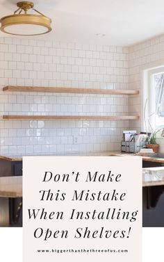 a kitchen with open shelves and the words don't make this mistake when installing one shelf