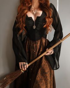 Channeling Gillian Owens… and pretending I live in the Practical Magic house, eat chocolate cake for breakfast, drink midnight margaritas and fly from the roof on Halloween… who wants to come over & sweep the dust of our exes out the door with witch brooms??? We need a full coven! 🧹✨🕯️ . Thank you to @disturbia for this entire witchy fit 🖤 Pair the Immortal Split Front Corset, Nixie Flare Sleeve Wrap Top & Rosamoth Button Up Midi Skirt (back soon) to recreate this Gillian inspired outfit 🍂 x ... Practical Magic Outfits, Outfits Whimsigoth, Gillian Owens, Button Up Midi Skirt, Elegant Witch, Witch Brooms, Witch Outfits, Practical Magic House