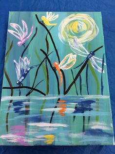 an acrylic painting of flowers in the water on a blue background with white, yellow and pink colors