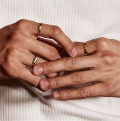 The Gold Tomboy Ring is one of our chunkiest stacking rings that takes dainty and gives it a gentle punch in the face (Gently!). With a minimal and chunky design, this thick gold band is easy to wear and looks great on everyone! Also available in sterling silver and recycled solid 14k rose gold, and in first knuckle (aka midi ring) sizes. Thick Gold Band, Punch In The Face, Midi Ring, Midi Rings, Ring Sizes, Engraved Rings, Gold Band, Stacking Rings, Gold Bands