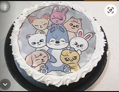 an image of a cake with cartoon animals on it