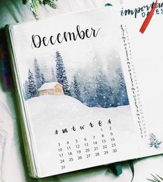 a calendar with the word december written on it next to a christmas tree and other decorations