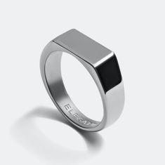 Ring Width 7 mm. Material 316L Stainless Steel Finish 925 Silver or 18K Gold Plating Origin: California, USA Timeless design. Made from the best gradients of 316L stainless steel - a metal that will stand the test of time. Trusted by the aerospace industry, it doesn't blacken or tarnish and is durable to water, sun, and all other elements. The always classic Signet Ring is the ultimate staple accessory. Featuring tapered edges and a perfectly leveled top, our Signet Ring is then finished with a Uday Kiran, Signet Ring For Men, Silver Ring Designs, Signet Ring Men, Signet Rings, Silver Signet Ring, Mens Silver Rings, Ring For Men, Perfect Gift For Him