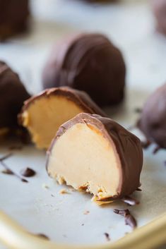 a close up of some chocolates on a plate