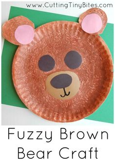 a paper plate with a bear face on it