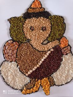 an image of a turkey made out of nuts