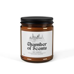 a jar of scented candles with the words chamber of scents in black on it