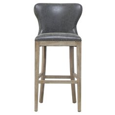 an upholstered bar stool with grey leather seat and nailing on the back