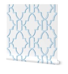 a white and blue wallpaper with an intricate design on it's side,