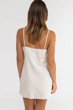 An essential wardrobe style, the Classic Slip Dress in soft hand feel ramie blend is your everyday go to for a fresh vacation vibe all year round. With adjustable straps and this breezy number will be a favourite throughout the seasons. Casual Linen V-neck Beach Dress, Spring Breezy Linen Sundress, Casual Sundress With Straight Neckline For Brunch, Summer Beige Cotton Sundress, Beige Cotton Summer Sundress, Beige Cotton Sundress For Summer, Casual Linen Sundress For Day Out, Beige V-neck Linen Dress For Beach, Chic Cami Sundress For The Beach