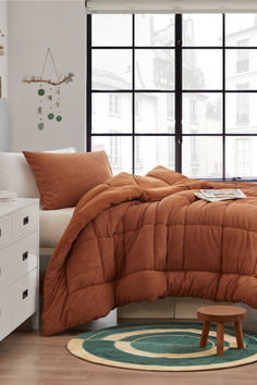 Our Fallin for Fall Coma Inducer® is working hard to be on that checklist of reasons why you look forward to Fall. Made of 300 GSM smooth to the touch plush and reversing to our Bare Bottom® cozy soft material, it is a combination that has you daydreaming of cooler weather. Plush Comforter, Oversized Comforter, Chirping Birds, Cozy Fall Vibes, Shade Of Brown, Changing Leaves, Autumn Night, Bedding Stores, Cooler Weather