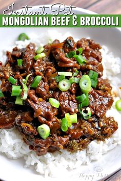 beef and broccoli over rice on a white plate