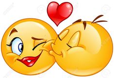 two yellow emoticions kissing each other with a red heart on the wall behind them