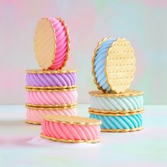 colorful cookies are stacked on top of each other