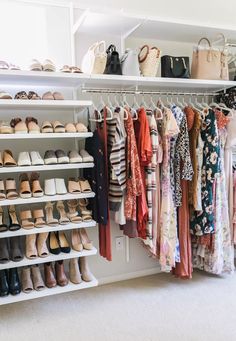 a closet filled with lots of different types of shoes and handbags hanging on the wall