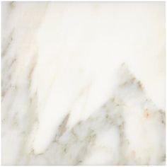 a white marble textured surface with some brown spots on the top and bottom part