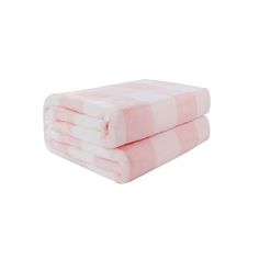 two pink and white towels stacked on top of each other