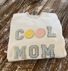 Cool Mom Custom Sweatshirt is the perfect for a gender reveal or mothers day gift. . The Chenille Letters have a glitter backing and sparkle in the light.  Oh so preppy and stylish! Unisex Sweatshirt is not fitted, loose fitting for extra comfort.  *Sweatshirt shown is Gildan Brand *White Color with patches *Interested in a different sweatshirt color? let us know when you check out. Varsity Patch Sweatshirt, Iron On Patch Sweatshirt, Iron On Sweatshirt Ideas, Sweatshirt Patches, Sweatshirts Ideas