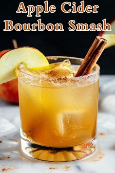 an apple cider bourbon smash is garnished with cinnamon