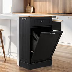 an open cabinet in the middle of a kitchen