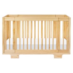 a wooden crib with white sheets on the bottom and sides, against a white background